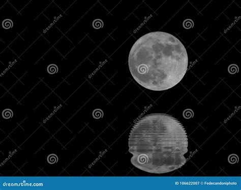 Full Moon and the Reflection on the Water at Night Stock Image - Image ...