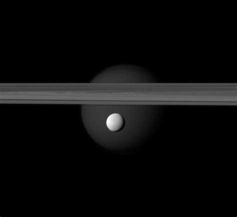 Saturn’s two most charismatic moons, Titan and Enceladus, photographed ...