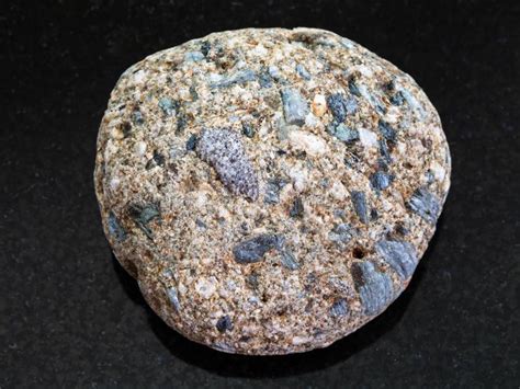 Pebble of Arkose Sandstone on Dark Background Stock Photo - Image of gemstone, black: 103207002