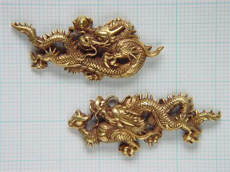 Pair of dragon menuki | Dragon sculpture, Jewelry inspiration, Sword art