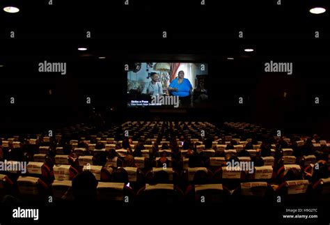 Cinema full of people watching a movie Stock Photo - Alamy