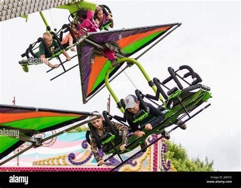 Hang glider ride at the county fair Stock Photo - Alamy