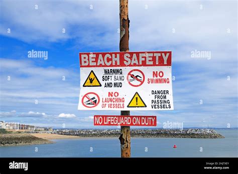 Beach safety warning sign Stock Photo - Alamy