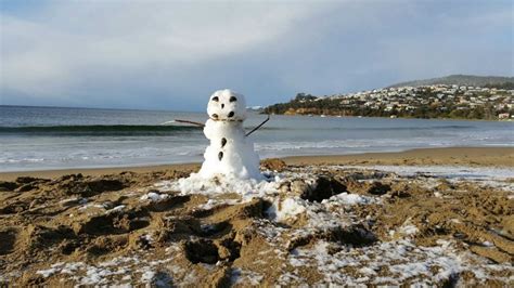 Tasmanian surfer tells of iconic photograph of snowy beach | Clifton ...