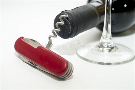 Folding Knife With Wine Opener, Glass And Wine Bottle On A White ...