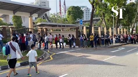 Queue at Malaysian High Commission in Singapore at around 8am on Friday ...