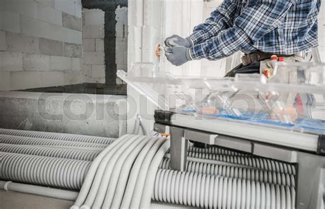 Electrician Worker Building Electric Systems Inside Residential ...