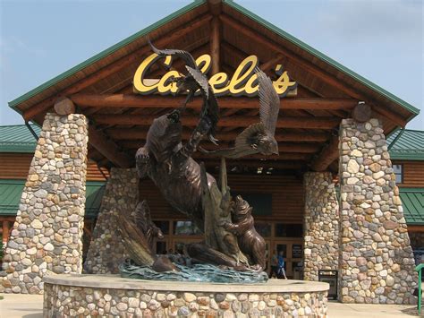 The hunting and fishing company Bass Pro Shops is buying Cabela's for ...