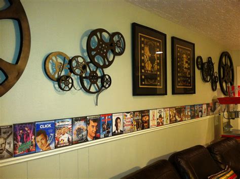 Theater Room Ideas. Take empty DVD boxes and display along the wall for added "free" decor. This ...