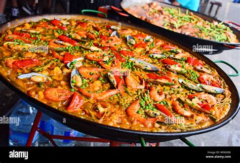 Spanish paella prepared in the street restaurant Stock Photo - Alamy