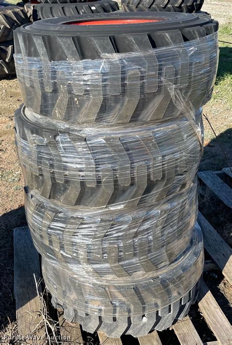 (4) 12-16.5 tires and wheels in Norman, OK | Item MI9697 sold | Purple Wave