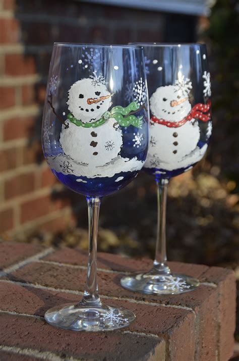 Whimsical Snowmen hand painted wine glass https://www.facebook.com ...