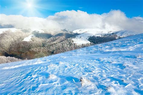 October mountain view with first winter snow and last autumn colourful ...