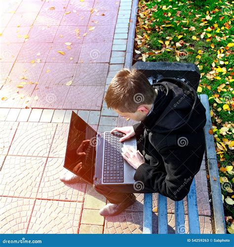 Guy with Laptop outdoor stock image. Image of chat, internet - 54259263