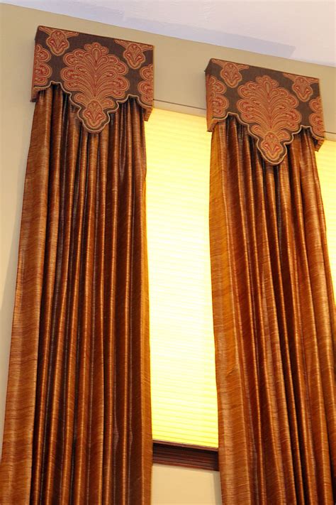 A closer look at these custom cornices which are uniquely shaped around ...