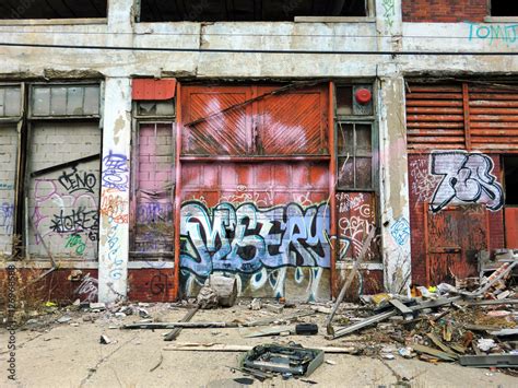 Urban ghetto building exterior with graffiti and debris Stock Photo | Adobe Stock