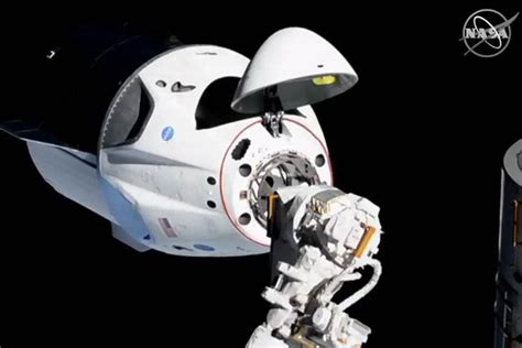 SpaceX's Crew Dragon docks with ISS in historic maneuver