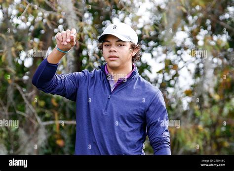 December 15, 2023: Charlie Woods testing the wind by throwing some grass during the Pro-Am at ...