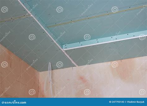 Repair of a Plasterboard Ceiling,installation of Sheets of Drywall in the Room at the Corners ...