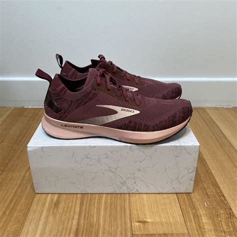 Brooks Women's Pink and Burgundy Trainers | Depop