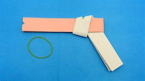 How To Make A Paper Gun That Shoots Rubber Bands - Easy Origami Gun ...