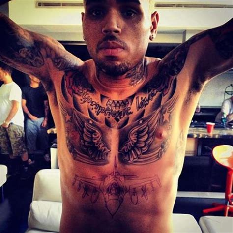 Chris Brown Gets FIGHTER JET Tattoo In SAME SPOT As Rihanna's LATEST ...