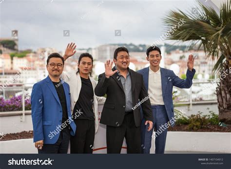 CANNES, FRANCE - MAY 23, 2019: Director Won-Tae Lee, Sung Kyu Kim, Don ...