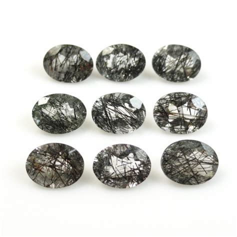 Gemstones-BLACK RUTILATED QUARTZ OVAL 8X6MM APPROX 9 CARAT- 9.00 Oval