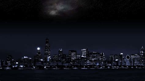 Download Enthralling Night View of a Dark City Wallpaper | Wallpapers.com