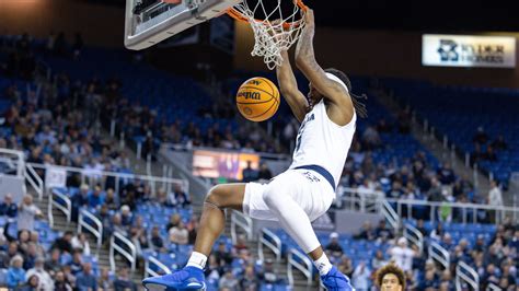 Photo gallery: Nevada basketball bumps UC Davis, Jeff Choate and baby races