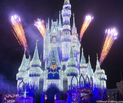 Like an Icy Blast Elsa Lights Up Cinderella Castle for the Christmas ...