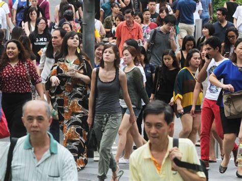 Singapore’s total population inches up to 5.64 million, after flat ...