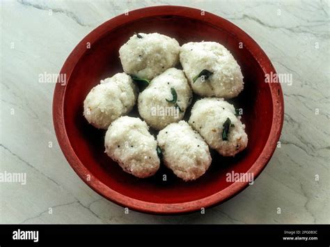 Kolakkattai steamed rough rice moulded in to ovular shape. Traditional savoury chettinad food ...