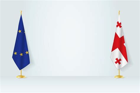 Premium Vector | European union and georgia flag on indoor flagpole ...