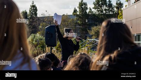 School assembly speaker with confidence in daylight outside Stock Photo - Alamy