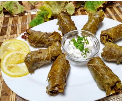 Turkish Dolmas (Stuffed Grape Leaves) Recipe - FoodsDiary