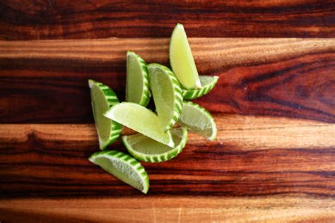 Use a knife to decorate lime wedges for a fun effect on a classic cocktail garnish! | Drink ...