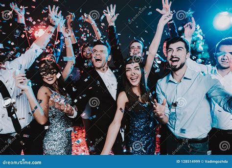 Smiling People Celebrating New Year on Party. Stock Image - Image of ...