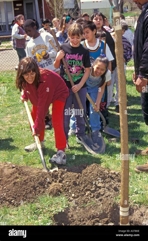 School children planting tree hi-res stock photography and images - Alamy