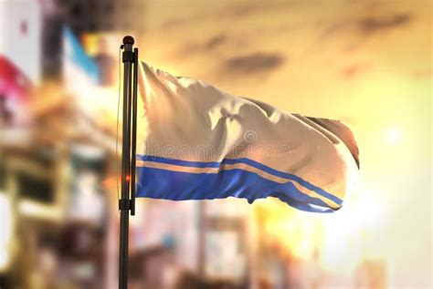 Altai Republic Flag Against City Blurred Background at Sunrise B Stock ...