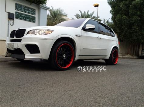 White BMW X5 on Contrasting Matte Black Strasse Wheels Featuring Red ...