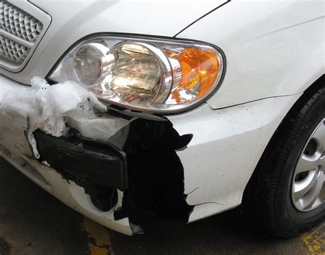 Snowbank vs Car Leads To Plastic Bumper Repair – Dent Repair Madison WI