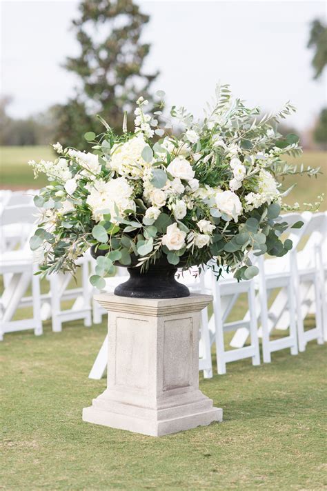 large outdoor wedding arrangement of white hydrangea, white lisianthus, white m… | Outdoor ...