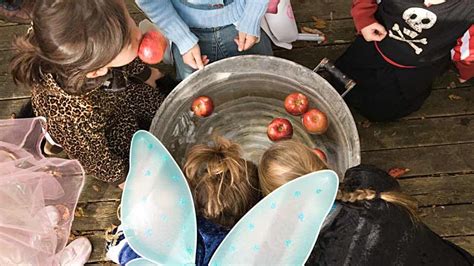 Try your hand at a spot of apple bobbing! | Spooky halloween party games, Fun halloween party ...