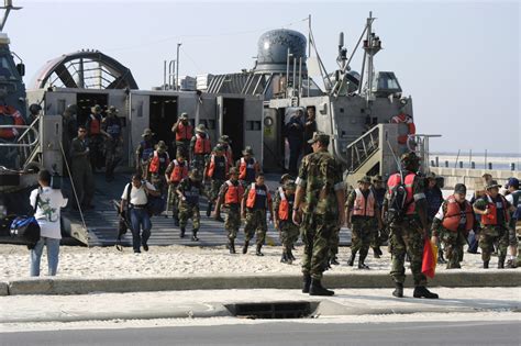 Mexican Navy Sailors assigned to the Mexican Navy Amphibious Ship PAPALOAPAN (P 411) (not shown ...