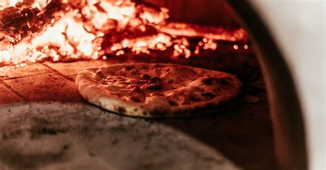 Selective Focus Photo of Pizza in Furnace · Free Stock Photo