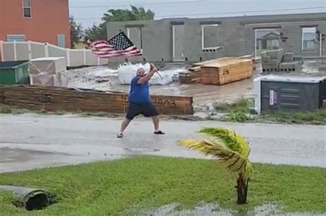 Florida man waves American flag in Hurricane Ian's face