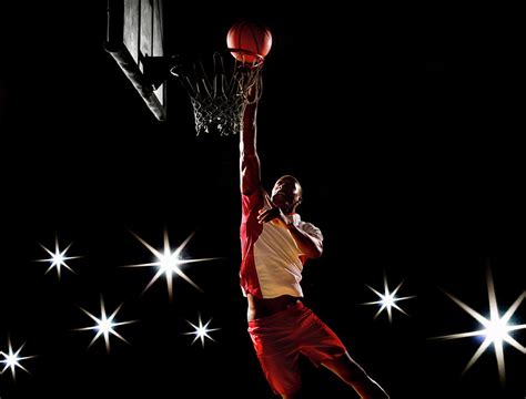 Basketball Player Dunking Basketball On Photograph by Compassionate Eye ...