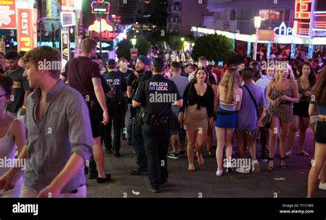 Tourists enjoy nightlife in Punta Ballena street in Magaluf Mallorca ...