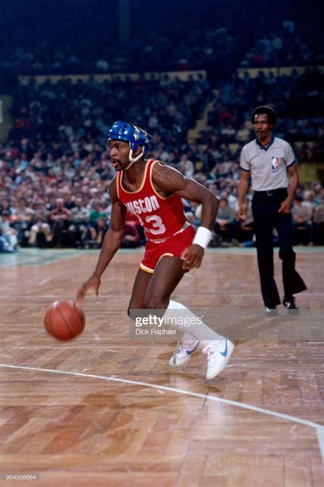 Calvin Murphy of the Houston Rockets handles the ball against the...